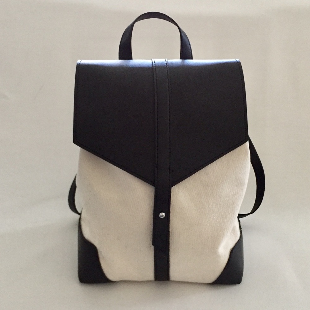 Deux Lux canvas cream & black backpack.  EUC